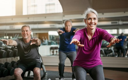 Older adults doing lower body strengthing exercises.