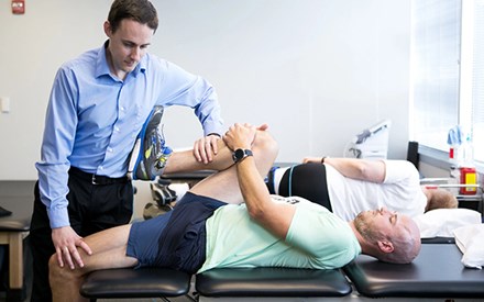 Physical therapist treating a patient with groin strain